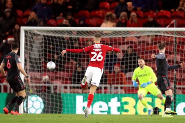 Middlesbrough's Lewis Wing scores his side's winning goal against Stoke City. Picture: Richard Sellers/PA