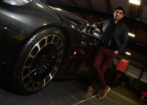 Afzal Kahn with a Kahn designed Aston Martin Vengeance. Pic: Bruce Rollinson