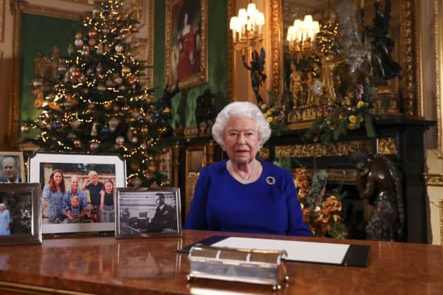 The Queen delivering her annual Christmas message. Photo: Steve Parsons/PA Wire