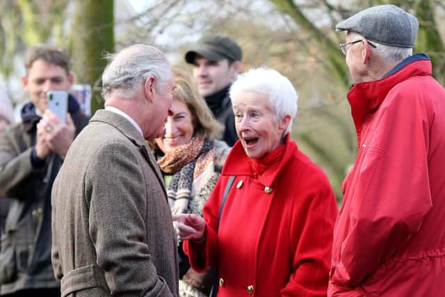The Prince of Wales speaks to local residents during a visit to Fishlake, in South Yorkshire, which was hit by floods earlier this year.  Picture: Nigel Roddis/PA Wire