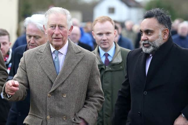 Prince Charles in Fishlake, South Yorkshire, which was hit by floods in November. Credit: Nigel Roddis/PA