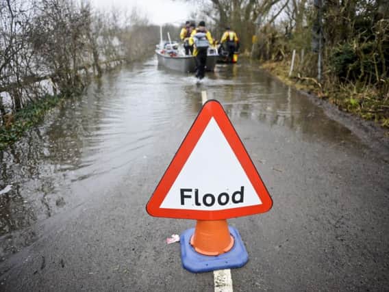 The Government has announced it will match fund donations for flooding victims. Photo: PA