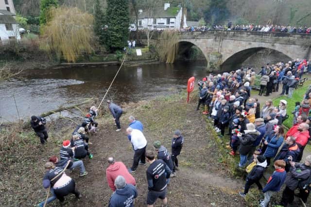 The ladies pull at the annual Boxing Day tug of war tradition over the River Nidd in Knaresborough.