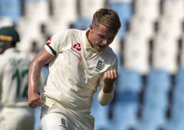 England's bowler Sam Curran reacts after dismissing South Africa's batsman Dwaine Pretorius (AP Photo/Themba Hadebe)