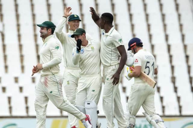 South Africa's bowler Kagiso Rabada, second from right, celebrates with teammates after dismissing England's batsman Jonny Bairstow, far right, for nine runs. (AP Photo/Themba Hadebe)
