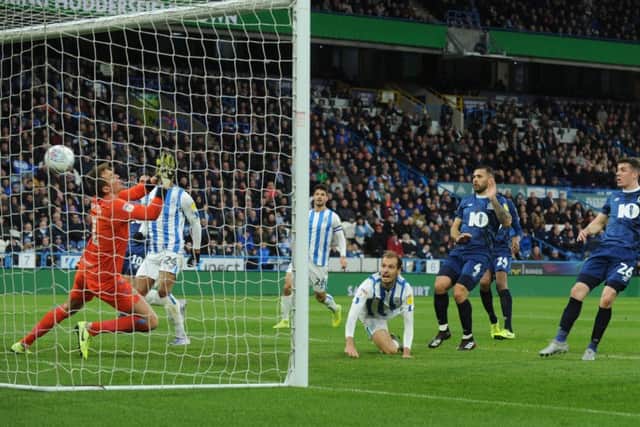 Jon Gorenc Stankovic scores for Huddersfield (Pictures: Steve Riding)