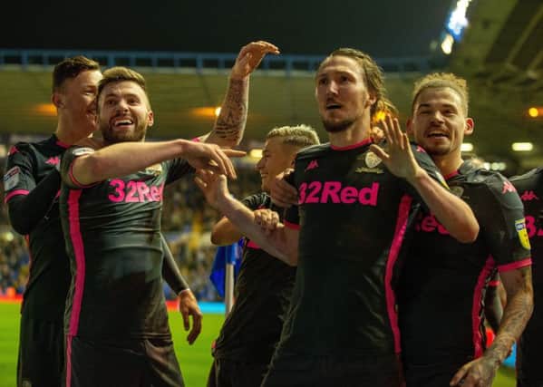 Leeds United celebrate after Wes Harding's own goal gives them a 5-4 win at Birmingham City (Picture: Bruce Rollinson)