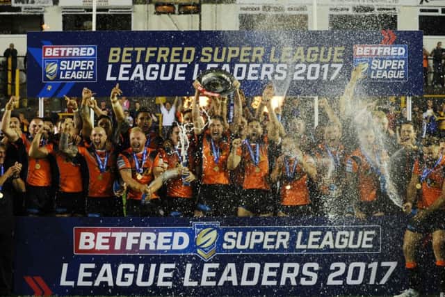 Castleford's players celebrate as captain Michael Shenton lifts the 2017 League Leaders Shield.
Picture: Jonathan Gawthorpe