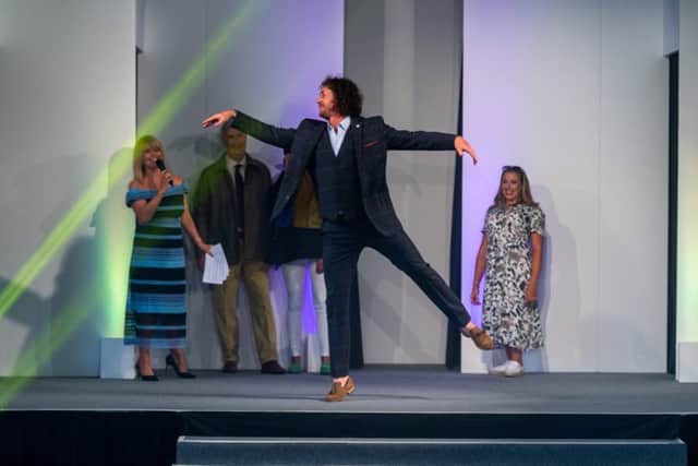 Cricketer Ryan Sidebottom wears a Brook Taverner suit at the 2019 Great Yorkshire Show, flanked by, from left, Christine Talbot, Peter Wright and Hannah Cockroft. Picture by James Hardisty.