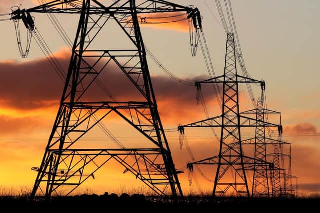 Library image of electricity pylons at sunset Picture: PA