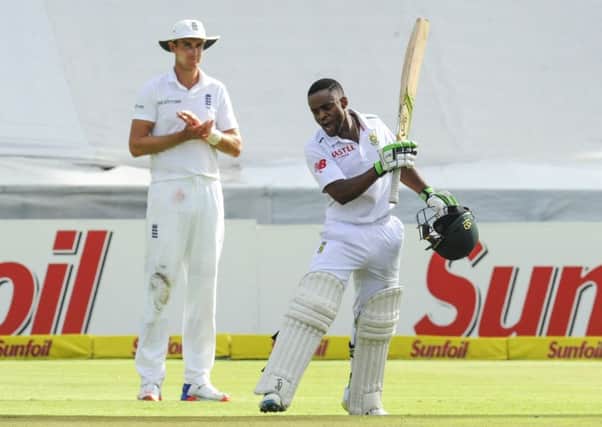 South Africa's Temba Bavuma, right, celebrates making a century against England in Cape Town back in 2016. Picture: AP