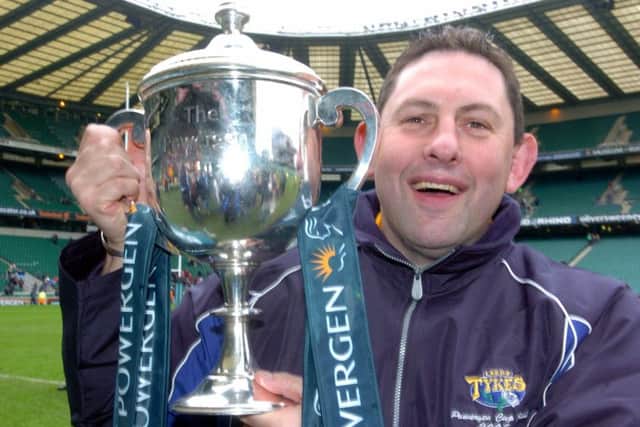 Phil Davies celebrates with the Powergen Cup won by Leeds Tykes in 2005