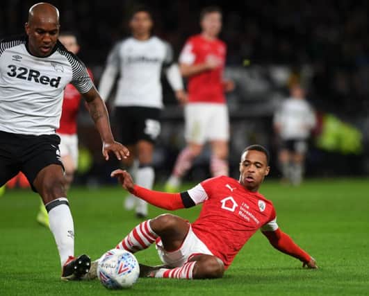 Sky Bet Championship.
Derby County v Barnsley.
Barnsley's Elliot Simoes takes on Derby's Andre Wisdom.
Picture Jonathan Gawthorpe
2nd January 2020..