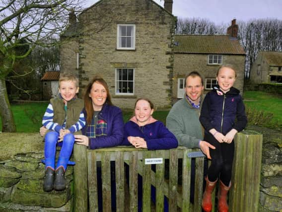 Chris Timm and his wife Lisa with children Oliver 5, Alice 10 and Isabelle 7 at their new home West Farm near Pickering