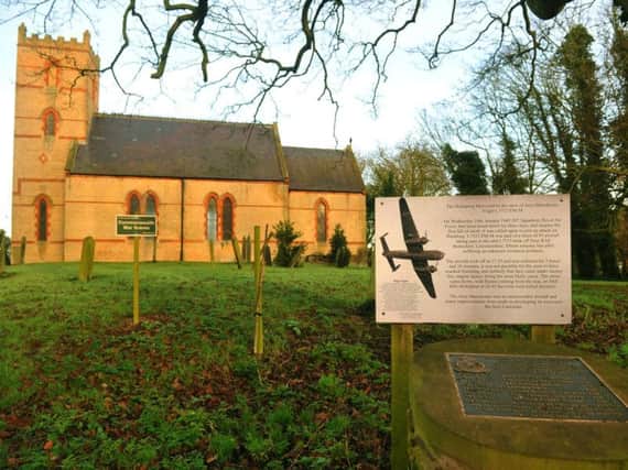 St Nicholas Church, Holmpton with the memorial to an RAF Bomber crew who crashed at nearby Mill Hill