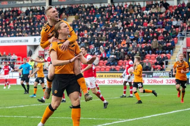 Tom Eaves celebrates his second goal with Jarrod Bowen as Hull City level 2-2 in today's FA Cup tie against Rotherham United. (PIC: BRUCE ROLLINSON)