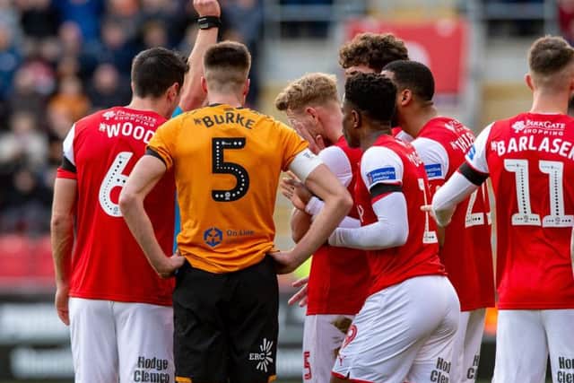 Rotherham's Adam Thompson is left with his head in his hands after his straight red card against Hull City in the 23rd minute. (PIC: BRUCE ROLLINSON)