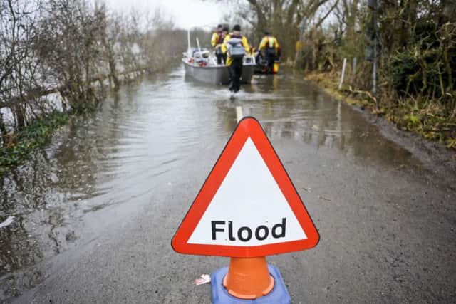Flood warning sign. Photo: PA