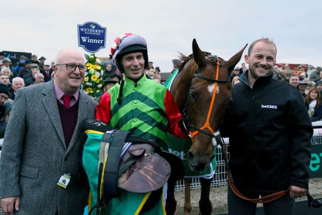 Connections celebrate Definitly Red's win in the Charlie Hall Chase in 2018.