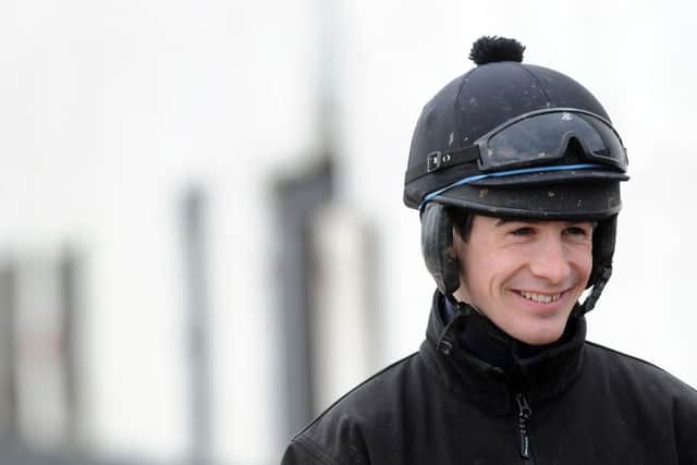 Former Grand National-winning jockey Ryan Mania recorded his 200th career victory when Mcgowan's Pass previaled at Ayr.