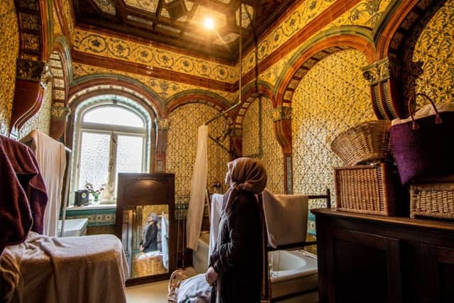 Artist Judith Levin, of Gledhow Hall, Leeds, in her bathroom, which was created and in decorated in Burmantofts faience - glazed architectural terracotta tiles - around 1885 in honour of a visit from the Prince of Wales (later Edward VII). Picture James Hardisty