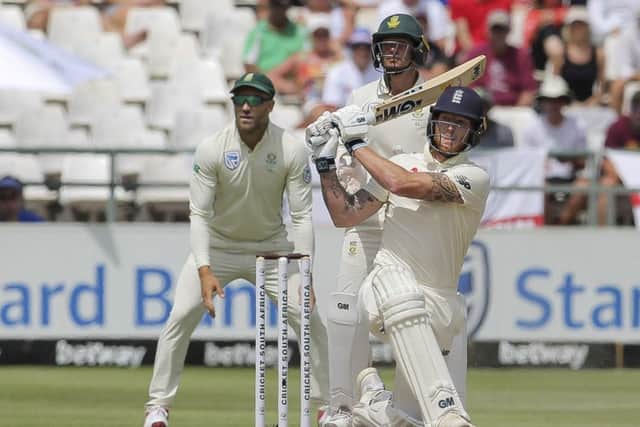 England's batsman Ben Stokes smashes the ball for six during day four at Newlands, Cape Town. Picture: AP/Halden Krog