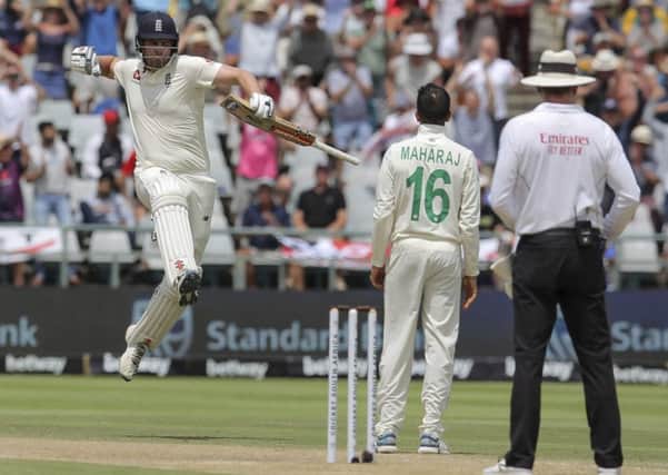England's Dom Sibley celebrates scoring his maiden Test match century, coming against South Africa at Newlands, Cape Town. Picture: AP/Halden Krog