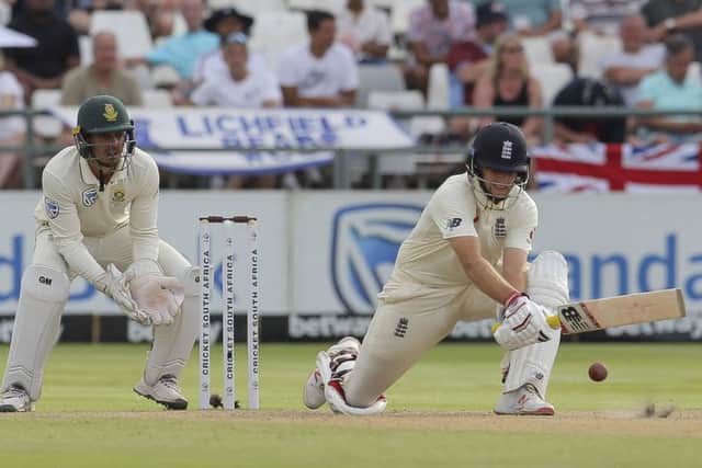 England captain Joe Root plays a reverse sweep during day four at  Newlands, Cape Town. Picture: AP/Halden Krog.