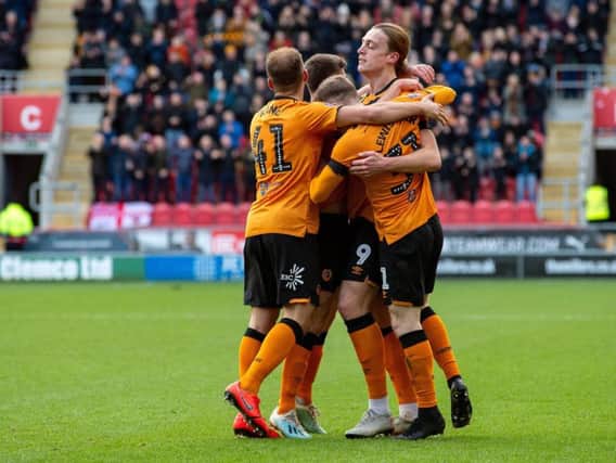 Tom Eaves scored a hat-trick as Hull City won a closely-fought FA Cup third round derby at Rotherham United