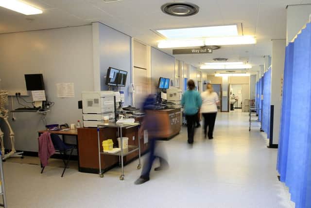 What will be done to tackle NHS staff vacancies?