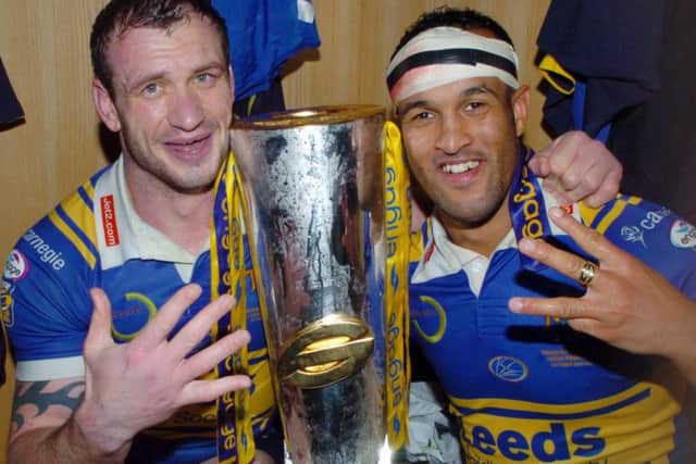 Jamie Jones-Buchanan and Jamie Peacock with the Grand Final trophy in 2008 (PIcture: Steve Riding)