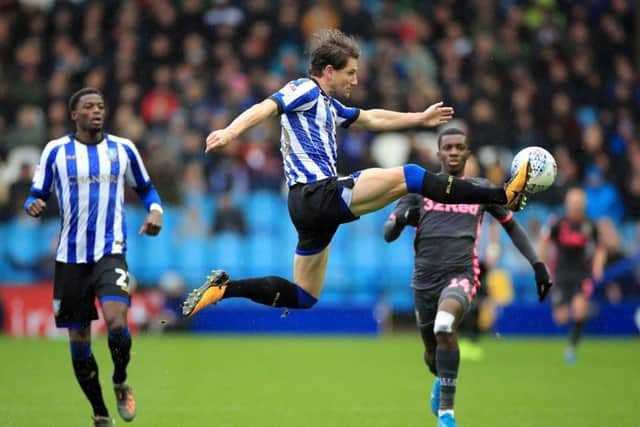 Sheffield Wednesday's Sam Hutchinson battles for possession in the derby against Leeds United at Hillsborough back in October. Picture: Danny Lawson/PA