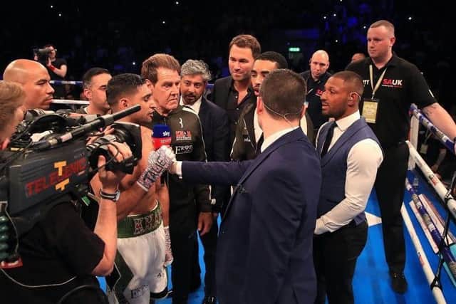 AS CLOSE AS IT GETS: Amir Khan shrugs off Kell Brook in a brief shouting match. Pic: PA.