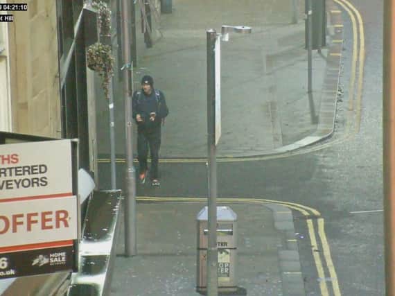 Police have released a CCTV image of a man they want to speak to in connection with the theft of two life-saving defibrillators in Barnsley.