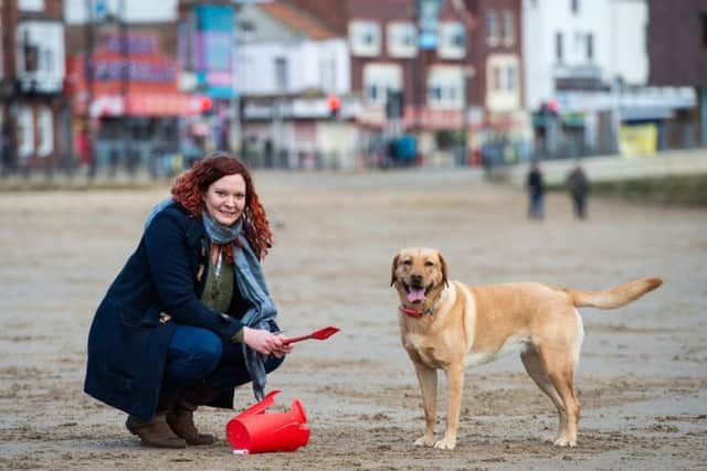 Molly and her owner Fliss Cater say they pick up hundreds of pieces of rubbish everyday. Credit: SWNS
