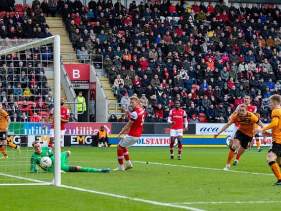 Tom Eaves scored a hat-trick as Hull City knocked Rotherham United out of the third round of the FA Cup