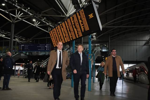 Cabinet ministers Jake Berry and Grant Shapps at Leeds Station.