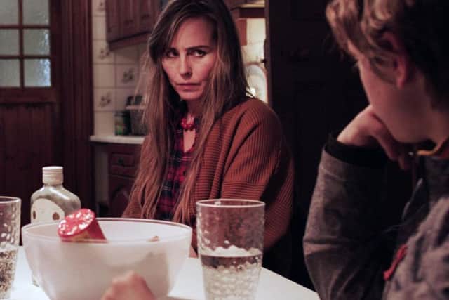 Tara Fitzgerald, as Maggie, a manic delight to watch as the deranged and drunken pub singing mum