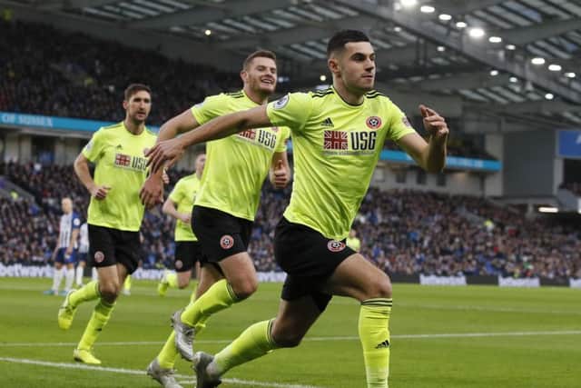John Egan of Sheffield United celebrates his goal against Brighton before it was ruled out by VAR during the Premier League match at the American Express Community Stadium (Picture: Simon Bellis/Sportimage)
