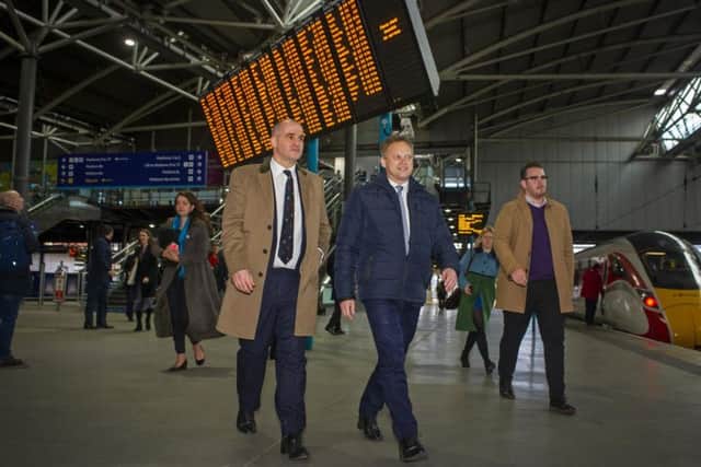 Jake Berry and Grant Shapps at Leeds Station.