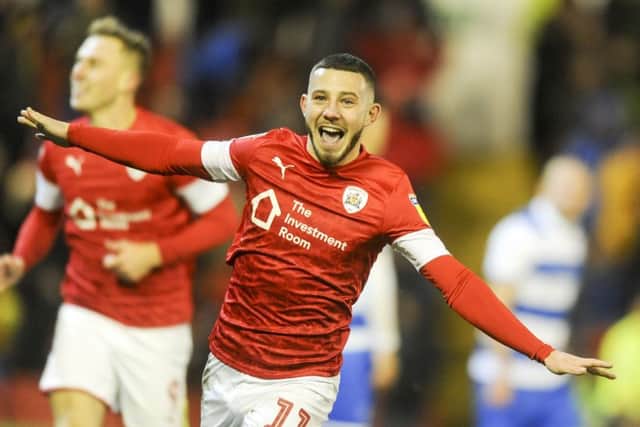TOP MAN: Barnsley's Conor Chaplin celebrates a hat-trick against QPR at Oakwell