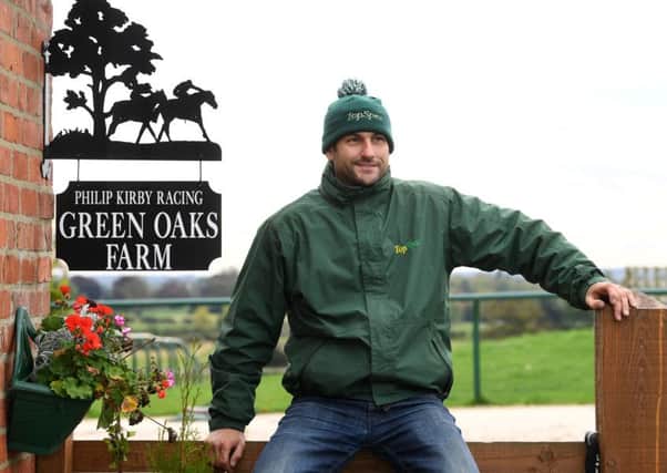 Racehorse trainer Phil Kirby at his yard in East Appleton, near Catterick.