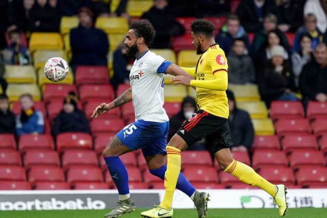 Tranmere Rovers's Stefan Payne (left) and Watford's Bayli Spencer-Adams battle for the ball during the FA Cup third round match at Vicarage Road (Picture: PA)