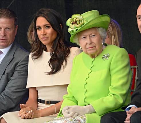 Queen Elizabeth II and the Duchess of Sussex at the opening of the new Mersey Gateway Bridge, in Widnes, Cheshire in June 2018. Picture: Clarke/The Sun/PA Wire