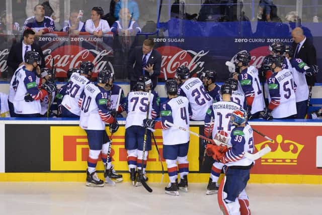 WELL-TIMED: Pete Russell talks to his players during a timeout called when 3-0 down to France at last year's World Championships in Slovakia. Picture courtesy of Dean Woolley.
