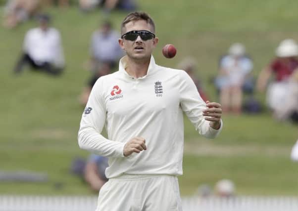 England's Joe Denly prepares to bowl during play on the final day of the second cricket test between England and New Zealand at Seddon Park in Hamilton. (AP Photo/Mark Baker)