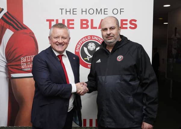 Chris Wilder manager of Sheffield Utd shales hands with owner of Sheffield Utd H.R.H. Prince Abdullah after signing a new four and half year contract. Picture: Simon Bellis/Sportimage