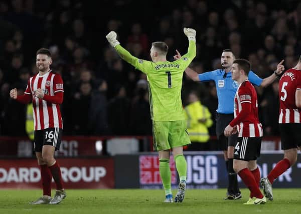 Sheffield United players celebrate VAR ruling out a West Ham United goal. Picture: James Wilson/Sportimage