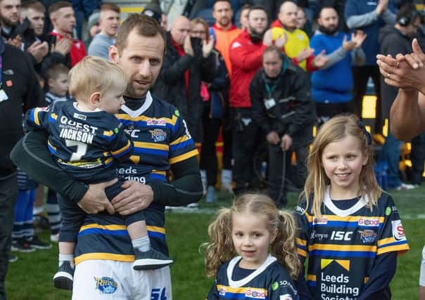 Rob Burrow with his children Macy, Maya and Jackson prior to kick off before the testimonial match at Emerald Headingley, Leeds. Photo: Dave Howarth/PA Wire.