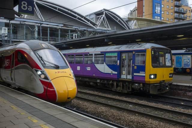 An LNER Azuma train and a Northern pacer train service at Leeds City Station . Picture Tony Johnson